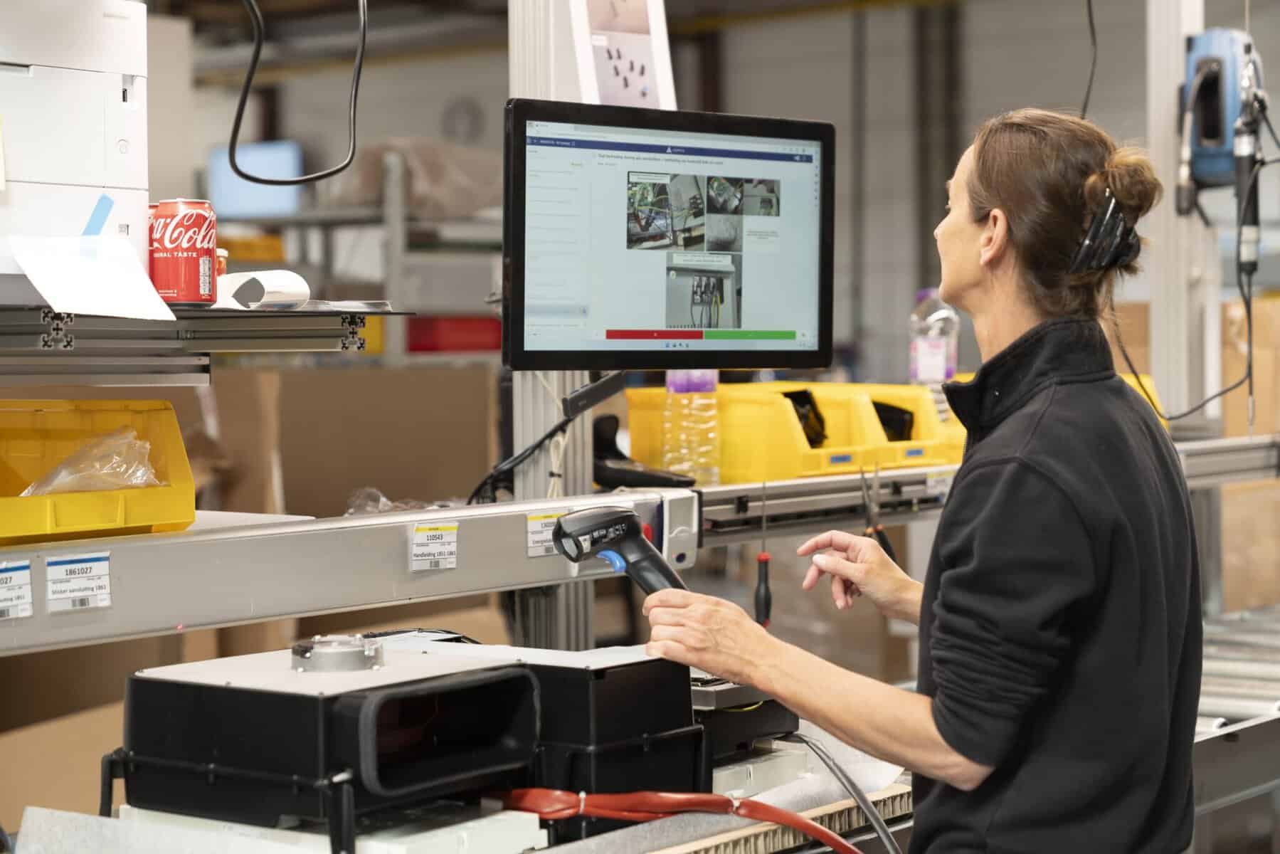 A computer screen displays a software interface from the Azumuta platform titled "5S audit checklist." The checklist includes various audit criteria such as safety and organization, with options to mark compliance status. A sidebar on the left shows navigation options.