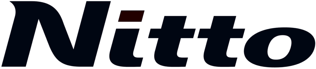 The image shows a logo featuring the word “Nitto” in dark blue, stylized cursive letters. The dot above the lowercase 