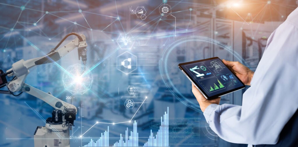 Smart industry control concept.Manager Engineer Hands holding tablet on blurred automation machine as background