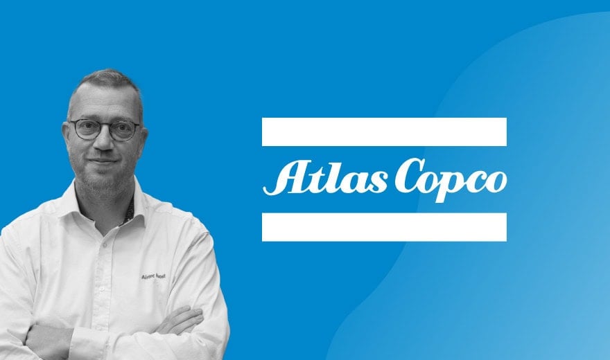 Atlas copco logo with Johan Dom