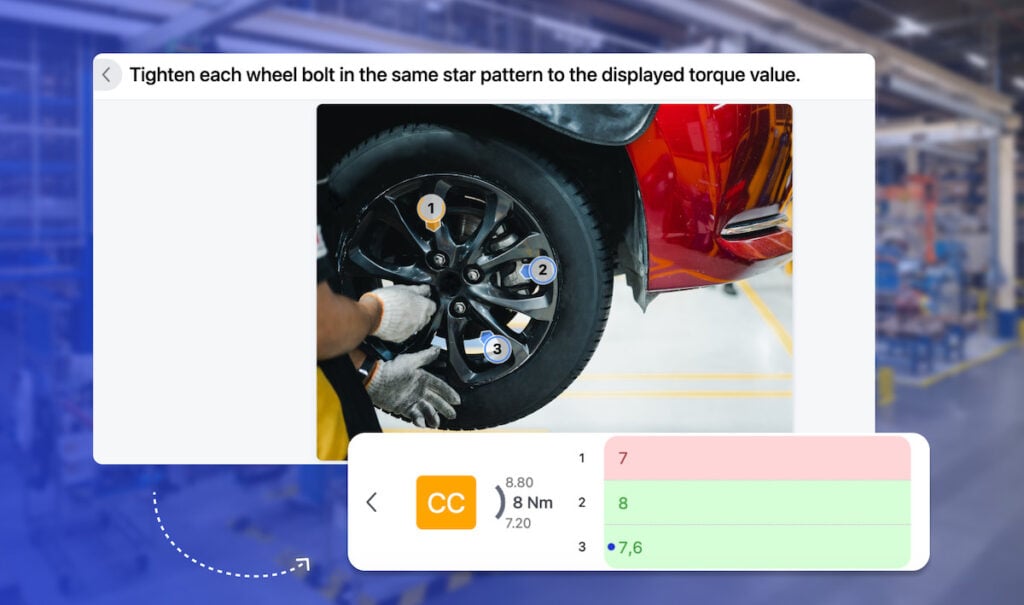 A car wheel is being worked on in a factory.