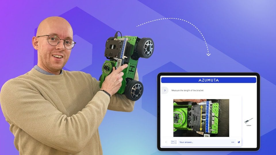 Batist Leman (CEO of Azumuta) demonstrating how to measure a component on a model vehicle using a digital caliper, with an Azumuta tablet interface illustrating the quality assurance process for precise manufacturing.