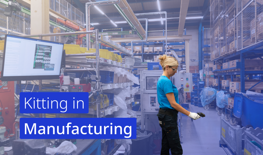 A manufacturing workspace featuring a worker in a blue uniform holding a tool, surrounded by organized shelves of components. A digital screen displays a kitting workflow, emphasizing the role of kitting in manufacturing processes.