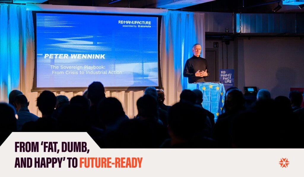 Peter Wennink speaking at a conference about European manufacturing sovereignty, showcasing Azumuta's digital solutions for Industry 4.0 and smart manufacturing.
